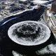 In this Monday, Jan. 14, 2019 aerial image taken from a drone video and provided by the City of Westbrook, Maine, a naturally occurring ice disk forms on the Presumpscot River in Westbrook, Maine.